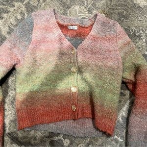 Fuzzy, cute, pastel colored sweater!